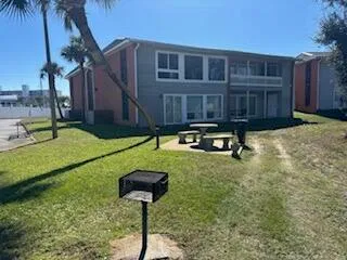 a house view with a garden space