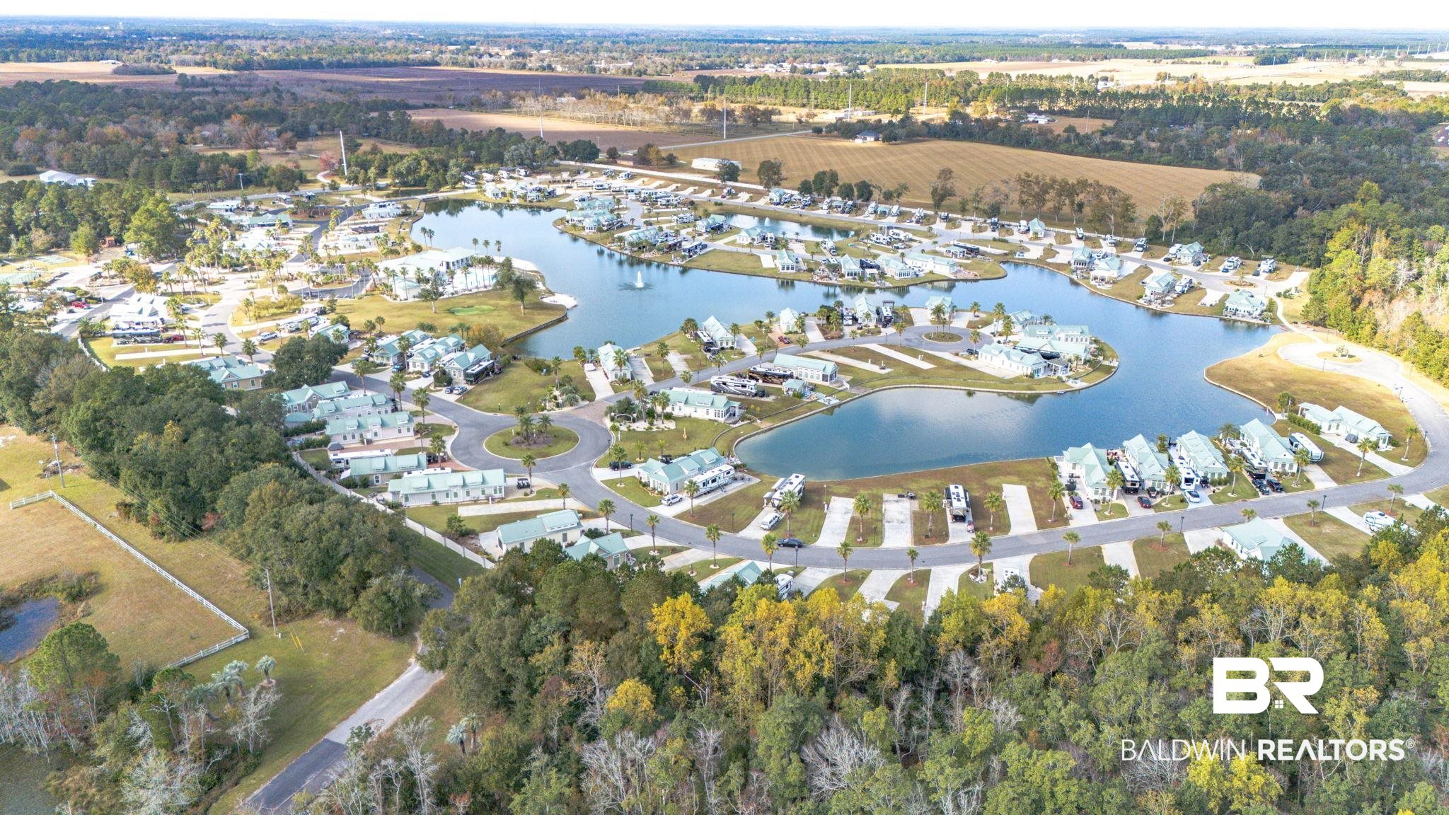 12004 Raptor Court Elberta, AL 36530 - Photo 55 of 57 Aerial view of property and surrounding area with a large body of water