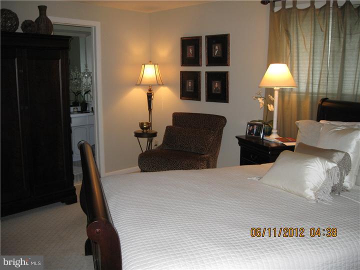 5 Saratoga Road Stratford, NJ 08084 - Photo 8 of 14 a bedroom with furniture and a window