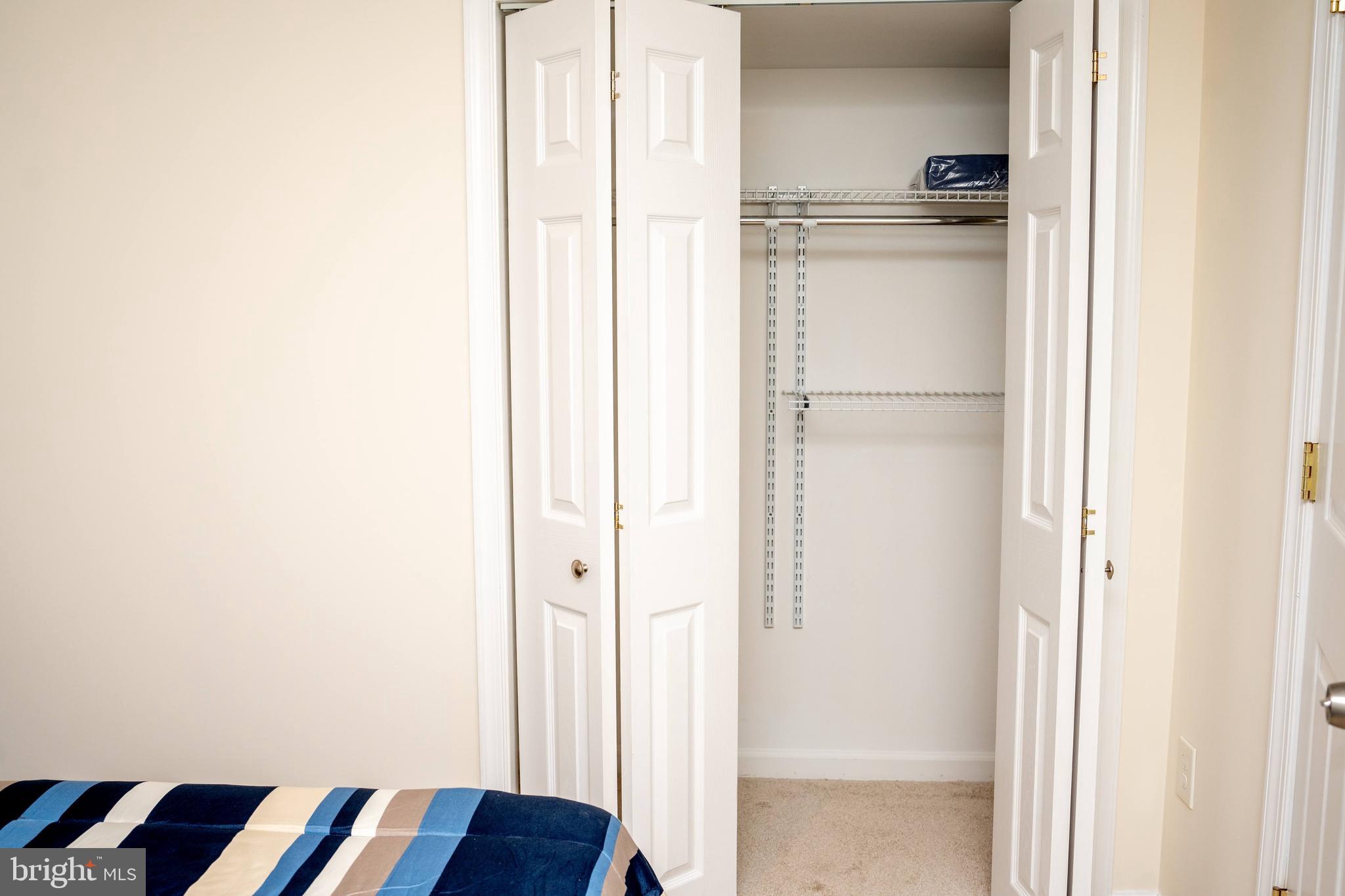 924 Veirs Mill Road Rockville, MD 20851 - Photo 10 of 12 a view of storage and utility room with washer and dryer