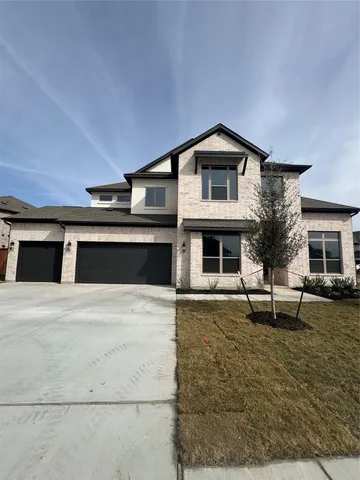 a living room with furniture fireplace and flat screen tv