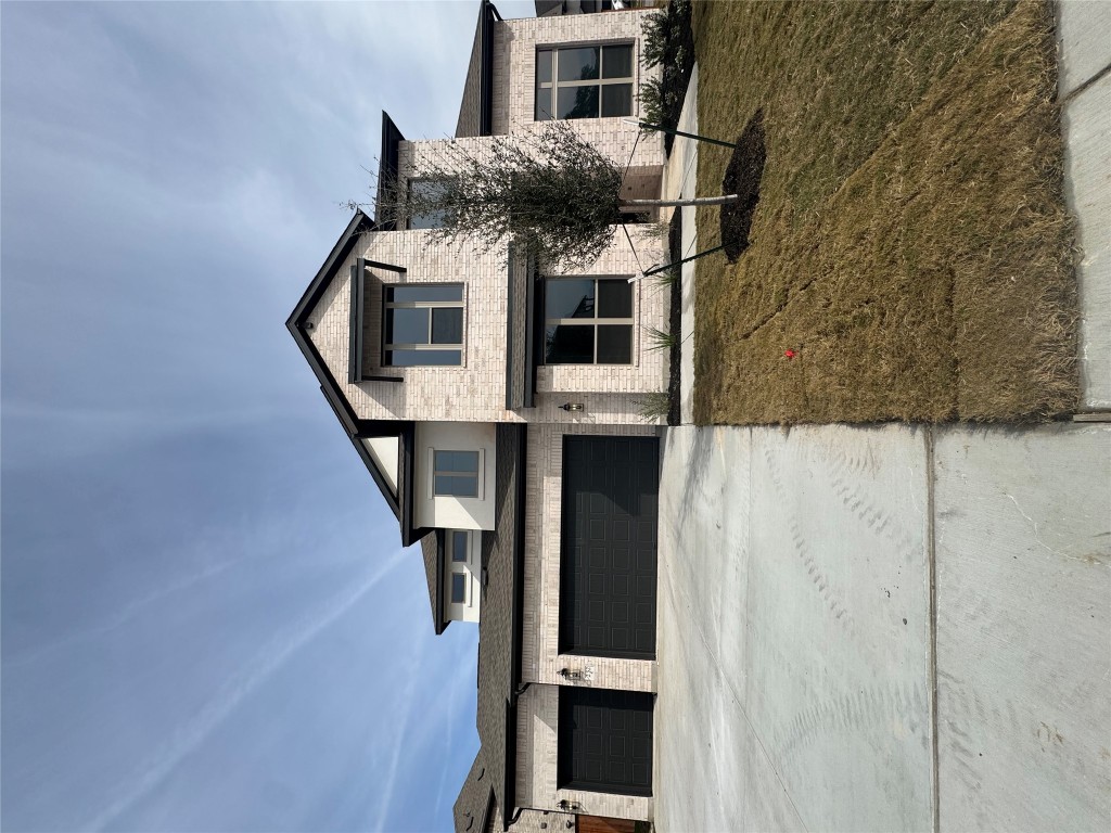 a living room with furniture fireplace and flat screen tv
