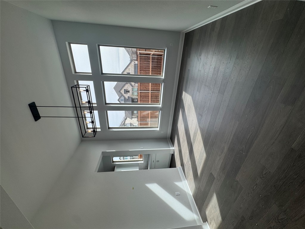 232 Camille Street Leander, TX 78641 - Photo 6 of 26 a view of an empty room with a window