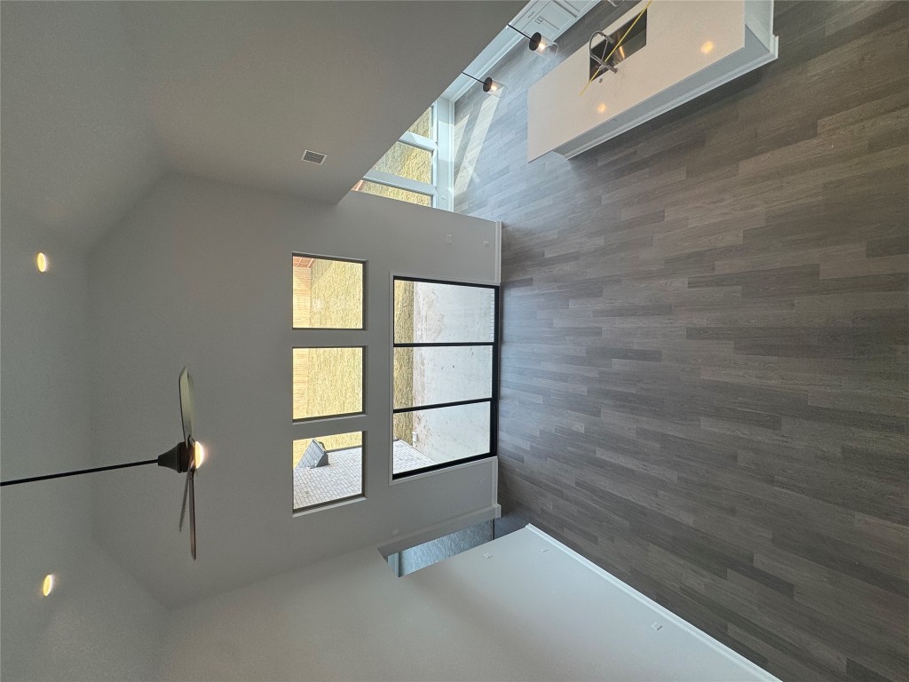 232 Camille Street Leander, TX 78641 - Photo 10 of 26 a view of a livingroom with wooden floor