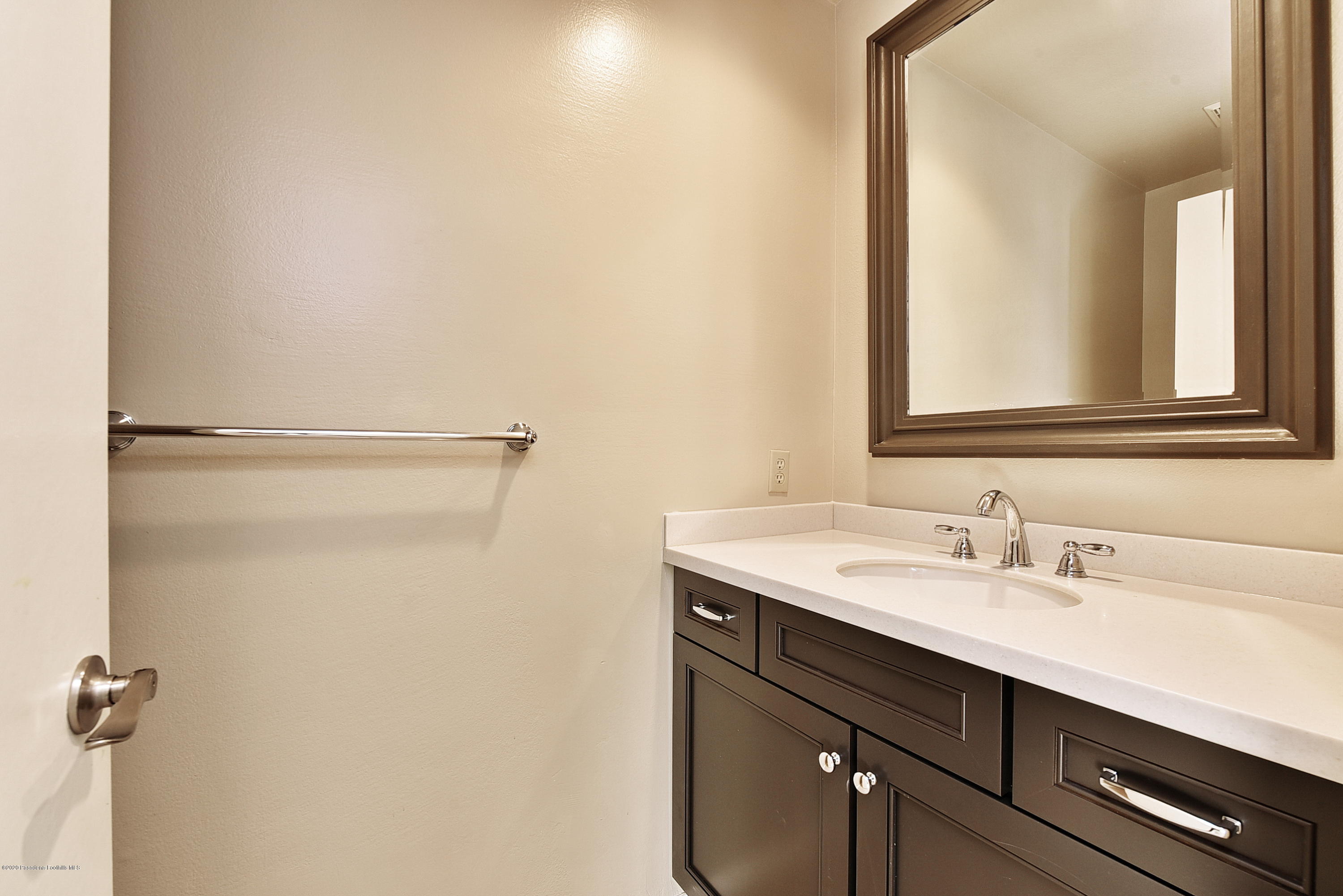 3107 Chadney Drive Glendale, CA 91206 - Photo 10 of 26 a bathroom with a sink and a mirror