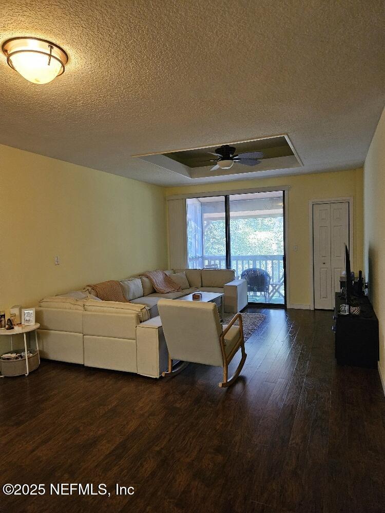 2970 Ravines Road, Unit 1326 Middleburg, FL 32068 - Photo 3 of 7 a living room with furniture and a large window