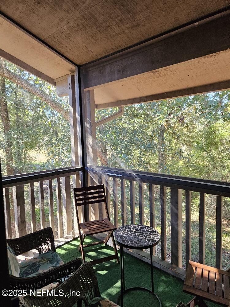 2970 Ravines Road, Unit 1326 Middleburg, FL 32068 - Photo 7 of 7 a view of a porch with furniture