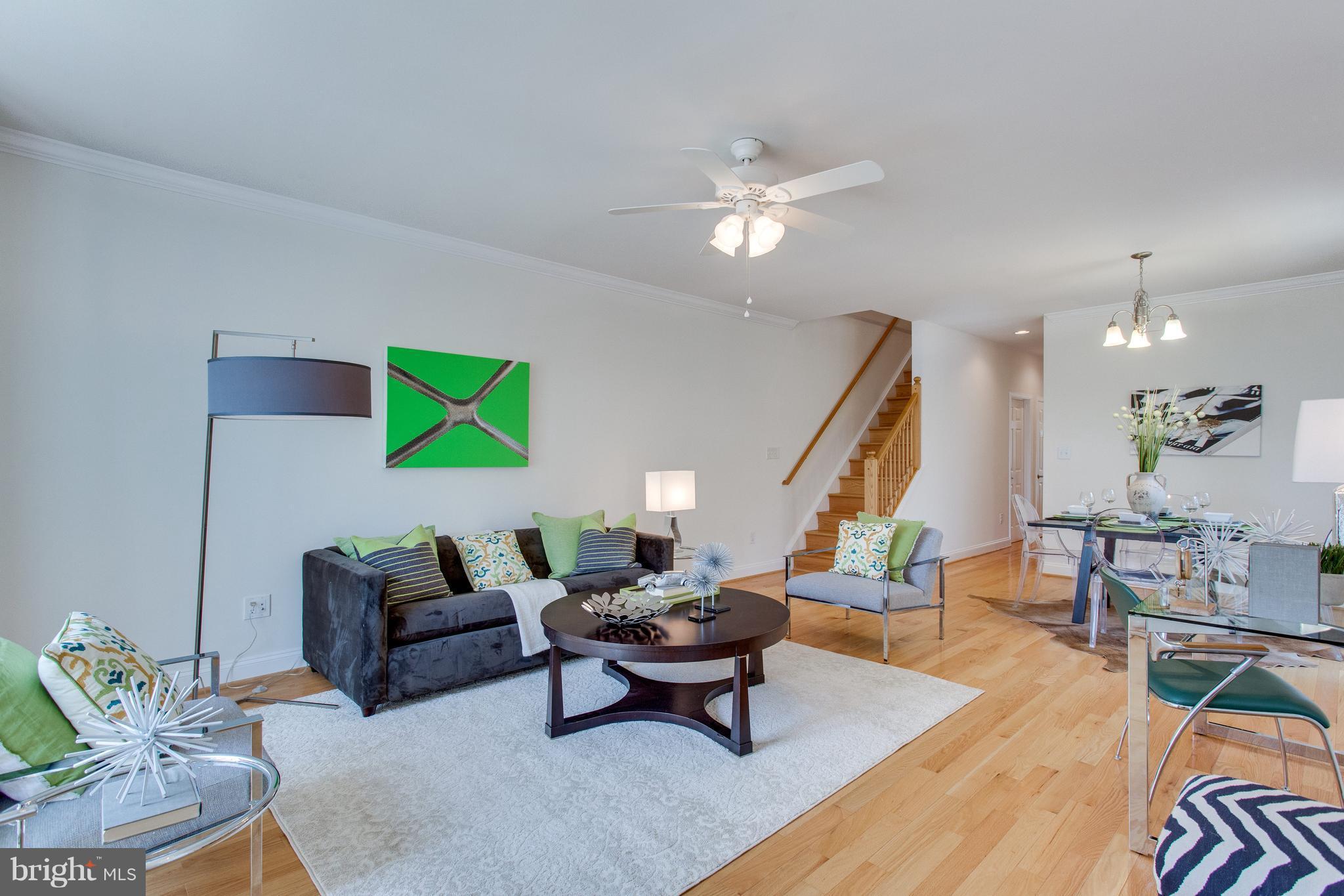 112 West Glebe Road, Unit A Alexandria, VA 22305 - Photo 2 of 30 Open-concept main level with gleaming hardwoods