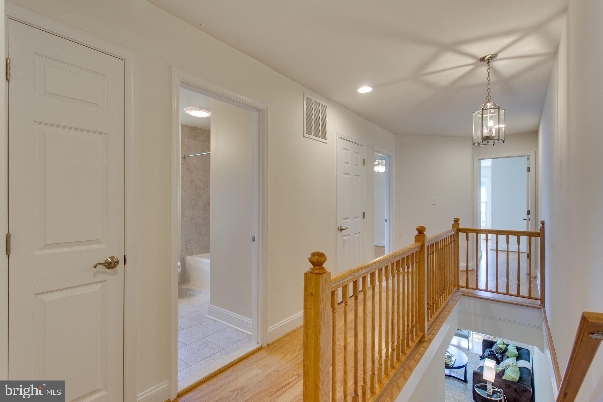 112 West Glebe Road, Unit A Alexandria, VA 22305 - Photo 15 of 30 Hardwood throughout the main and upper levels