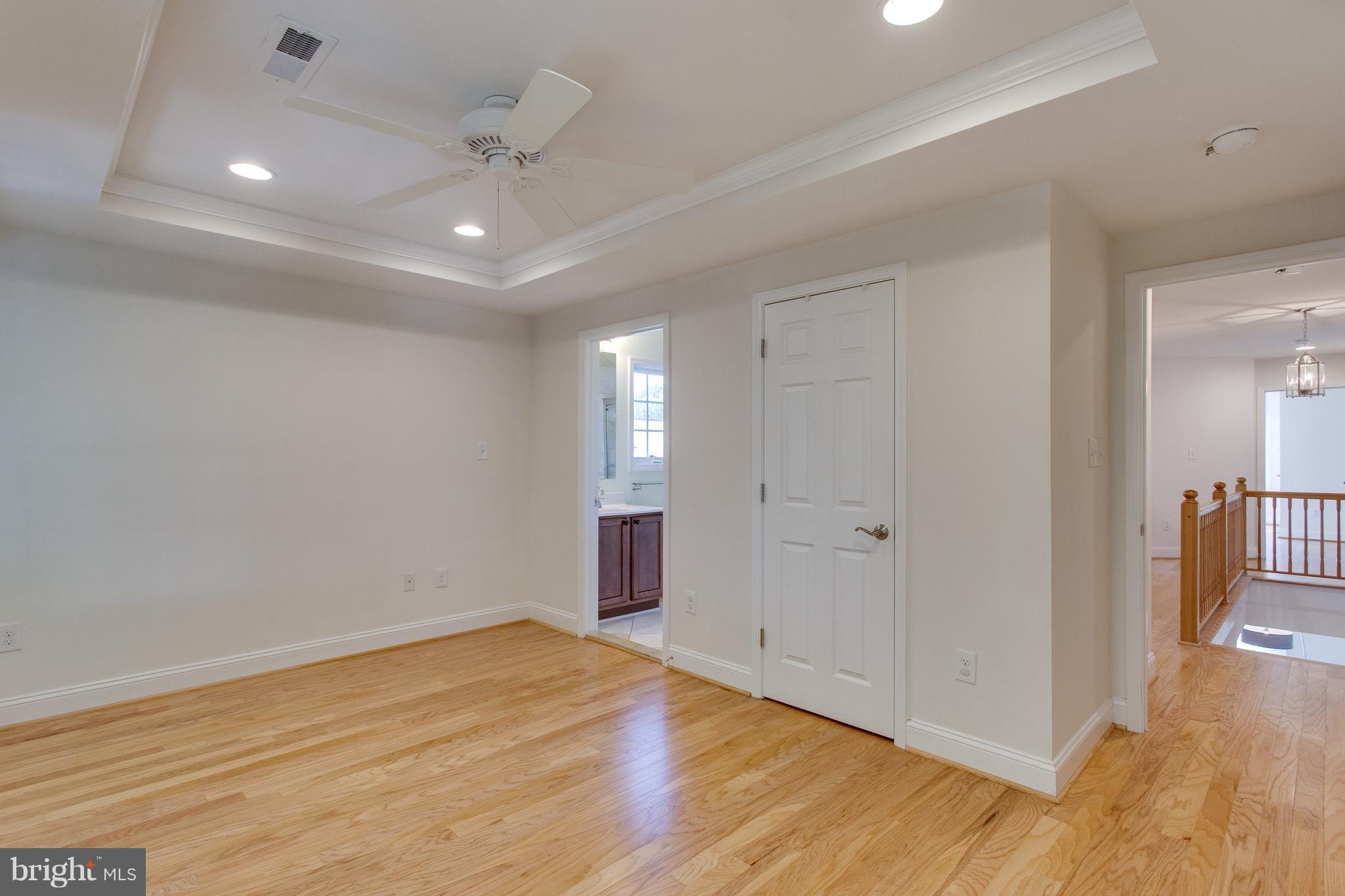 112 West Glebe Road, Unit A Alexandria, VA 22305 - Photo 16 of 30 Master suite with walk-in closet and tray ceiling