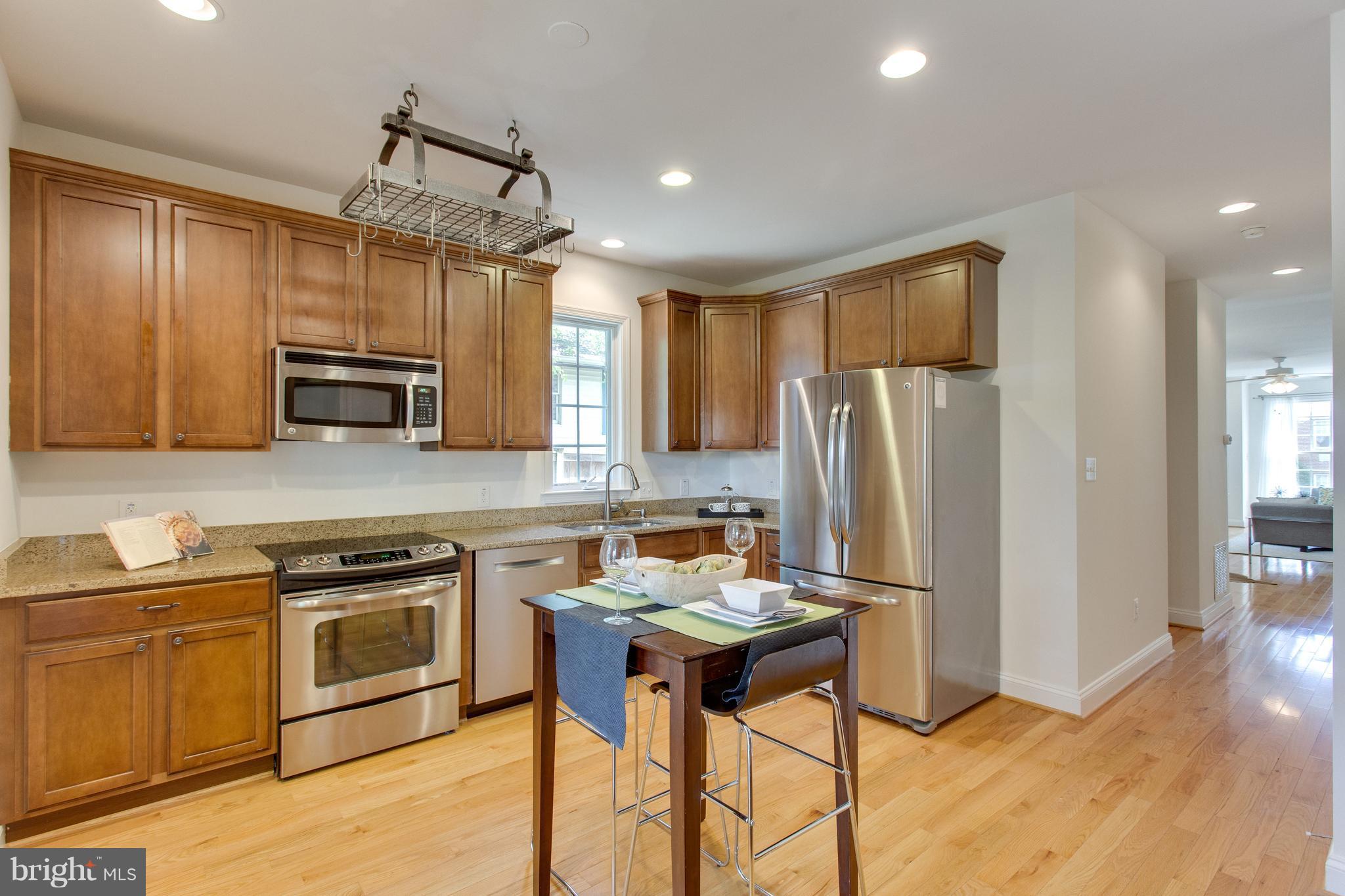 112 West Glebe Road, Unit A Alexandria, VA 22305 - Photo 10 of 30 Open kitchen with stainless steel appliances