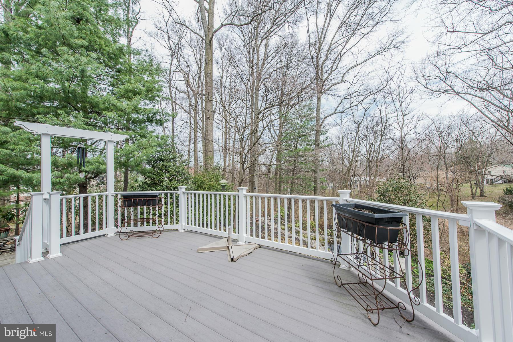 3677 Meadowvale Road Ellicott City, MD 21042 - Photo 26 of 30 a view of balcony with wooden floor and fence