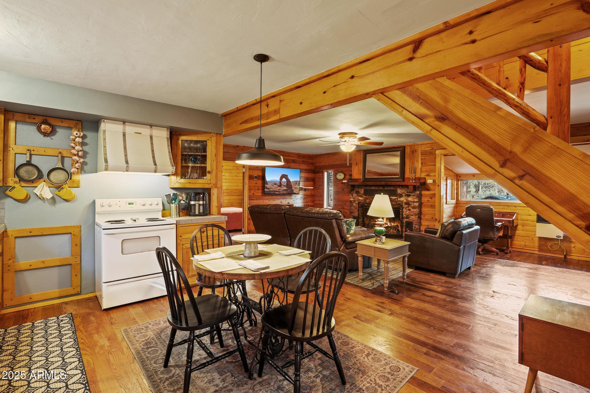 199 West Mockingbird Lane Payson, AZ 85541 - Photo 12 of 36 a dining room with furniture and wooden floor