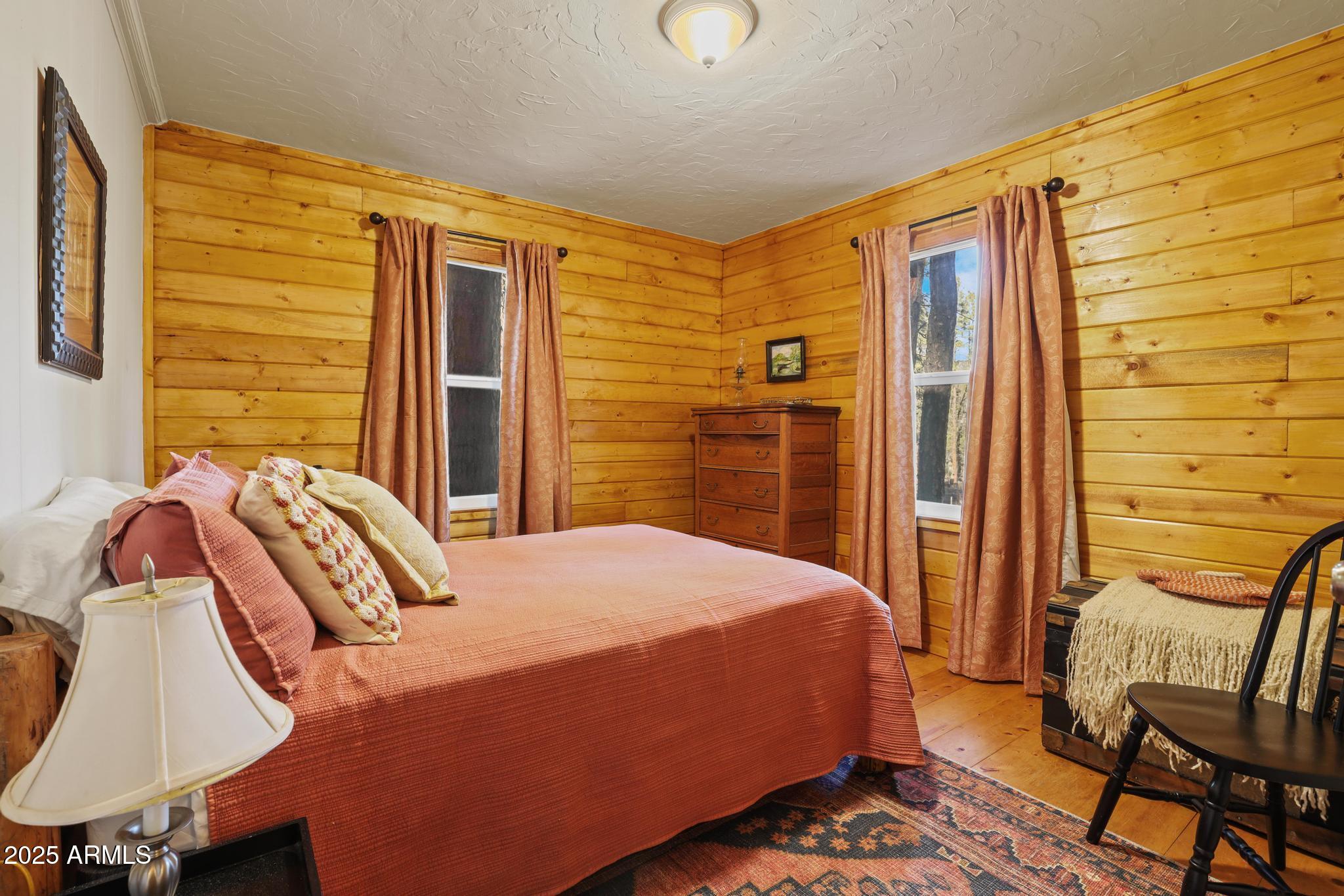 199 West Mockingbird Lane Payson, AZ 85541 - Photo 14 of 36 a bedroom with a bed chair and a window