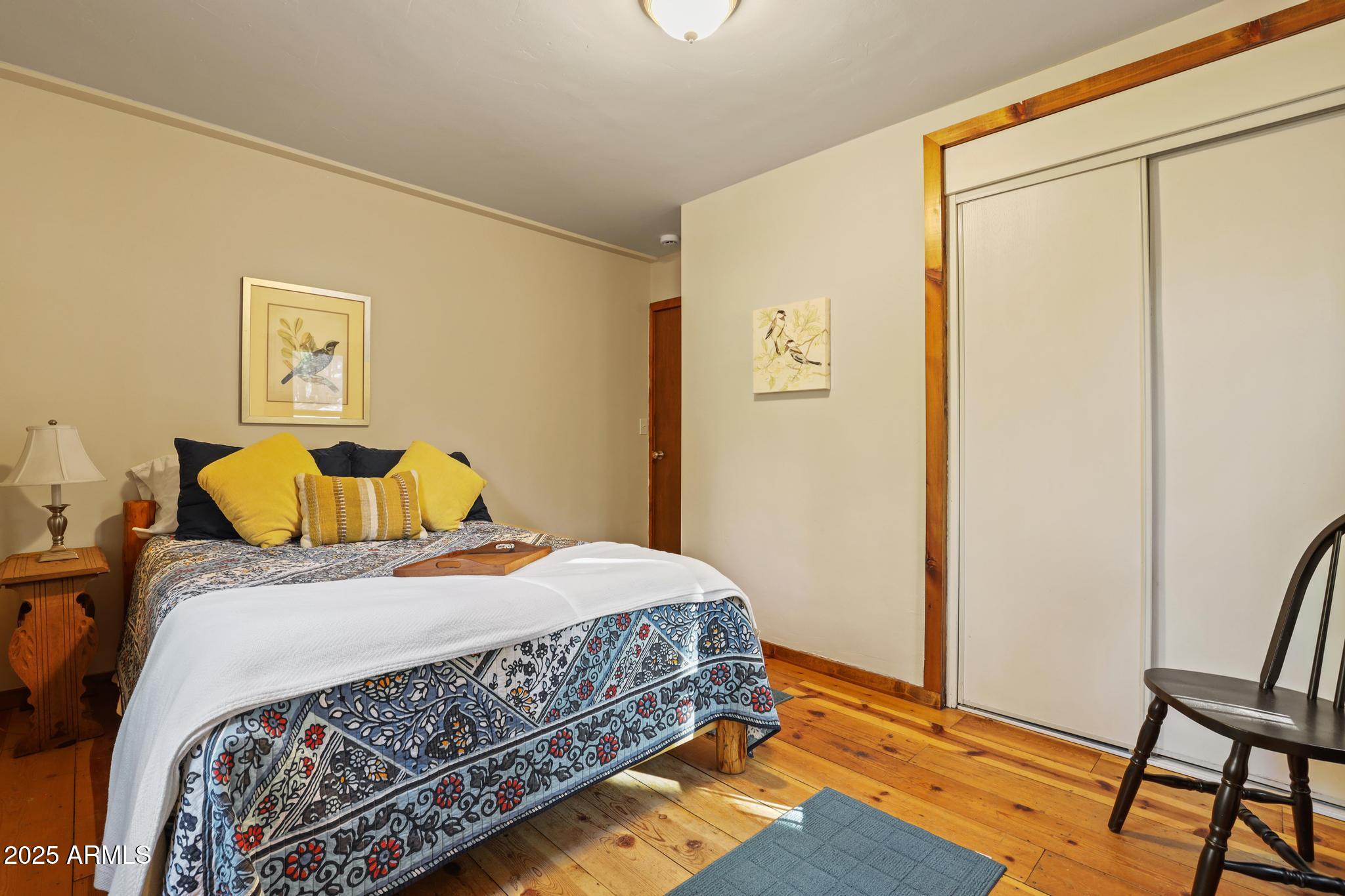 199 West Mockingbird Lane Payson, AZ 85541 - Photo 16 of 36 a bedroom with a bed and a table in it