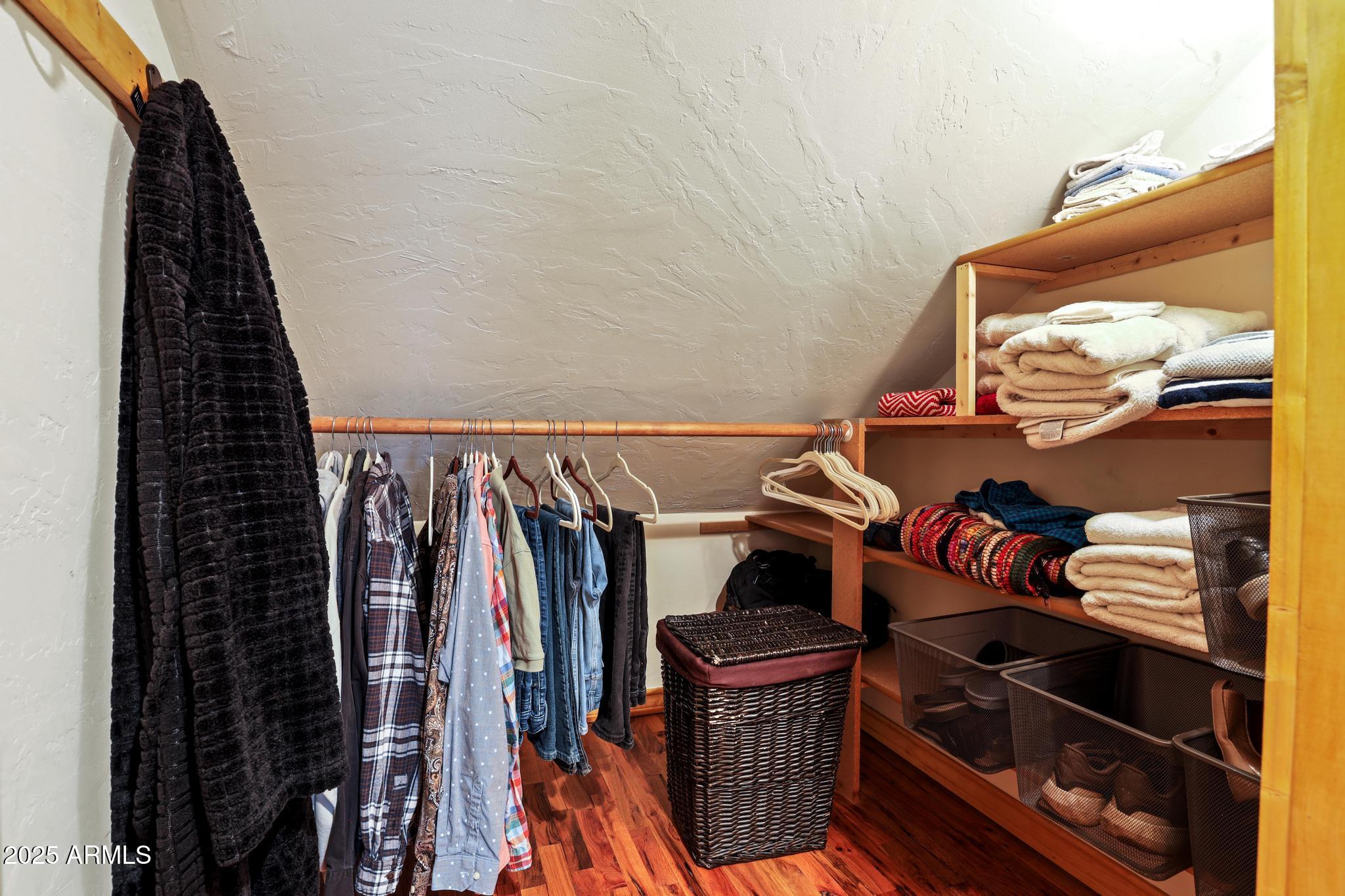 199 West Mockingbird Lane Payson, AZ 85541 - Photo 23 of 36 a view of walk in closet with clothes and shoes