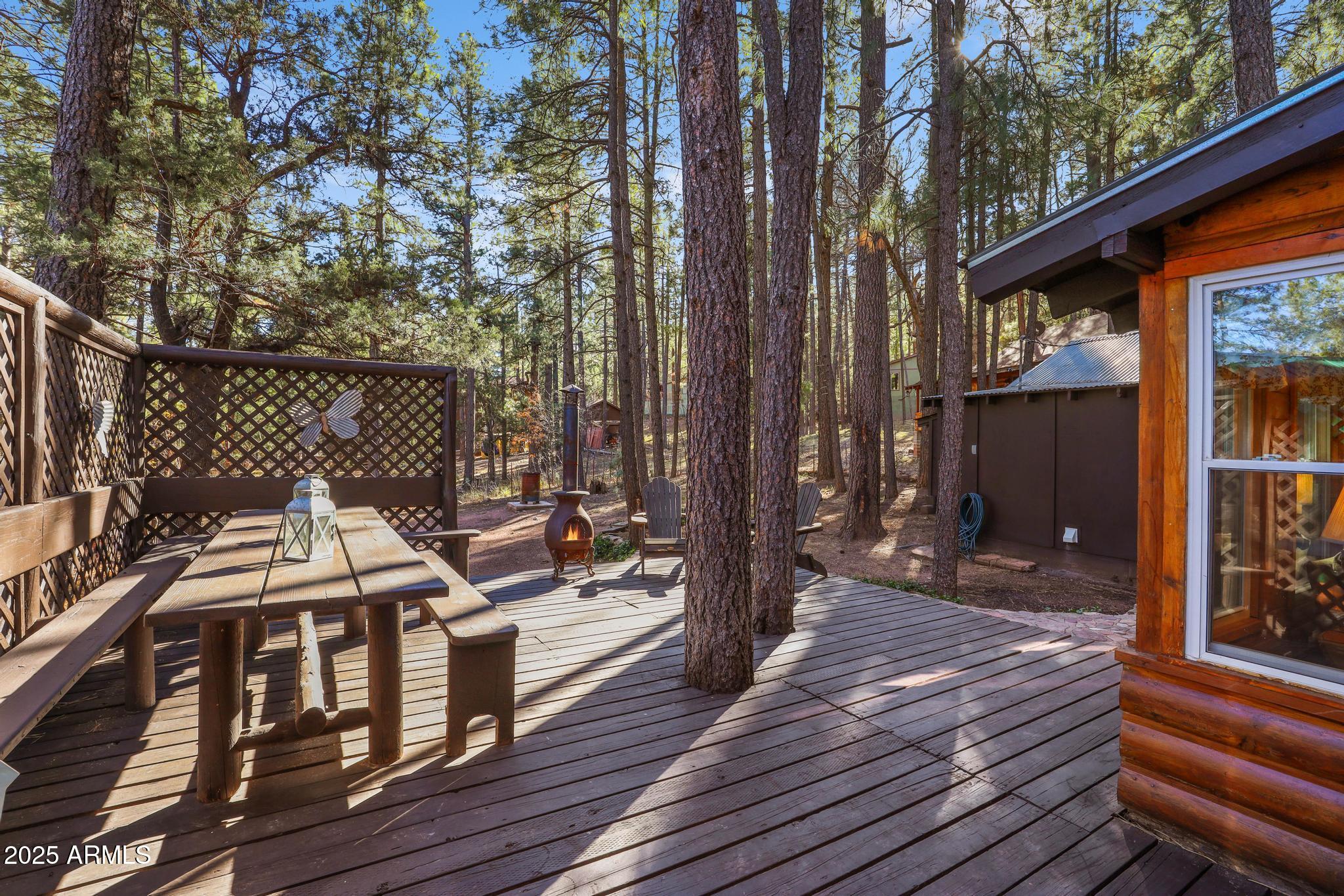 199 West Mockingbird Lane Payson, AZ 85541 - Photo 24 of 36 a view of a deck with chairs and wooden floor