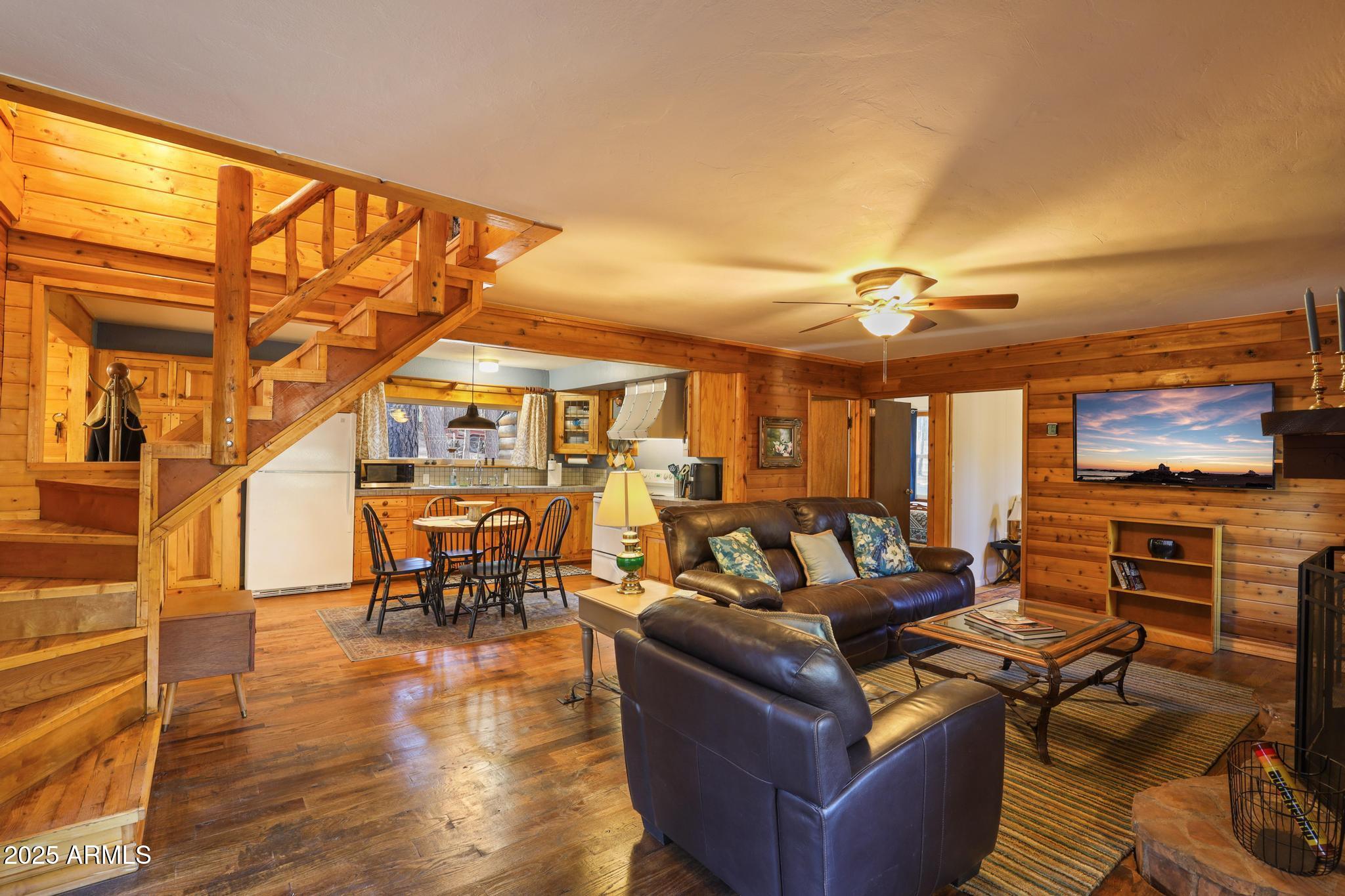 199 West Mockingbird Lane Payson, AZ 85541 - Photo 5 of 36 a living room with furniture and a flat screen tv