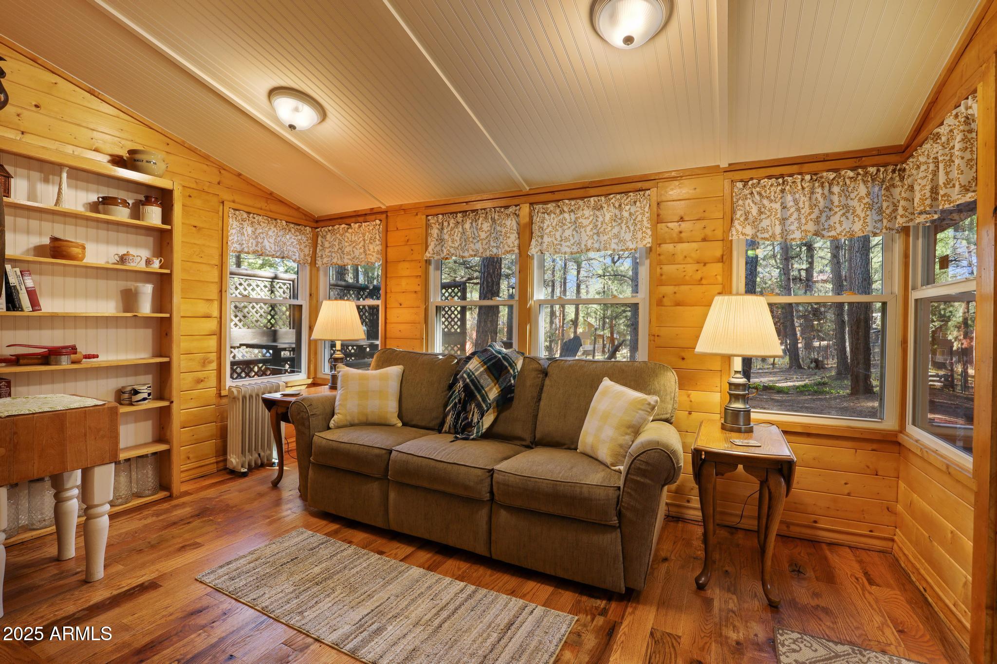 199 West Mockingbird Lane Payson, AZ 85541 - Photo 6 of 36 a living room with furniture and a large window