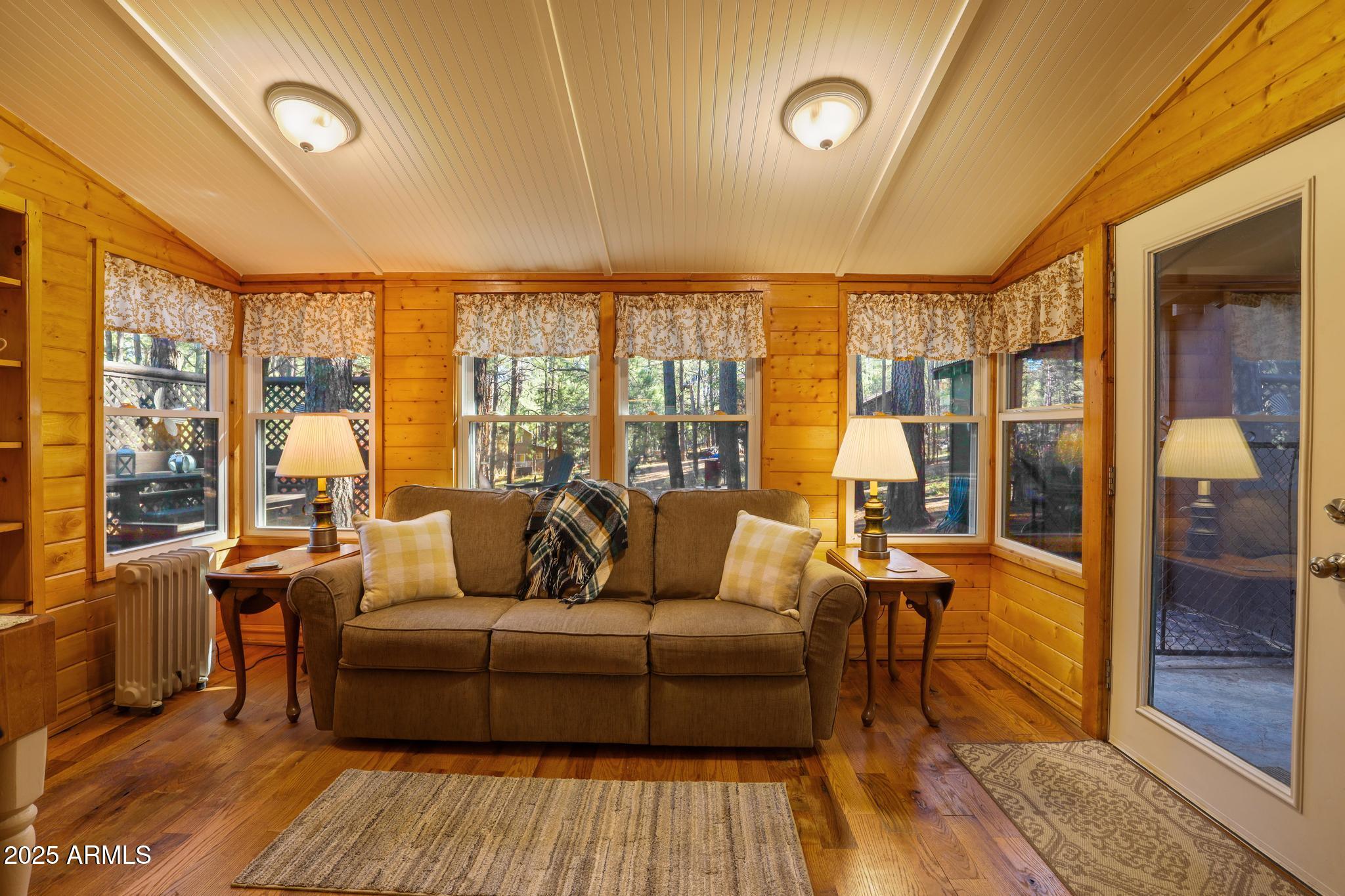 199 West Mockingbird Lane Payson, AZ 85541 - Photo 8 of 36 a living room with furniture and a large window