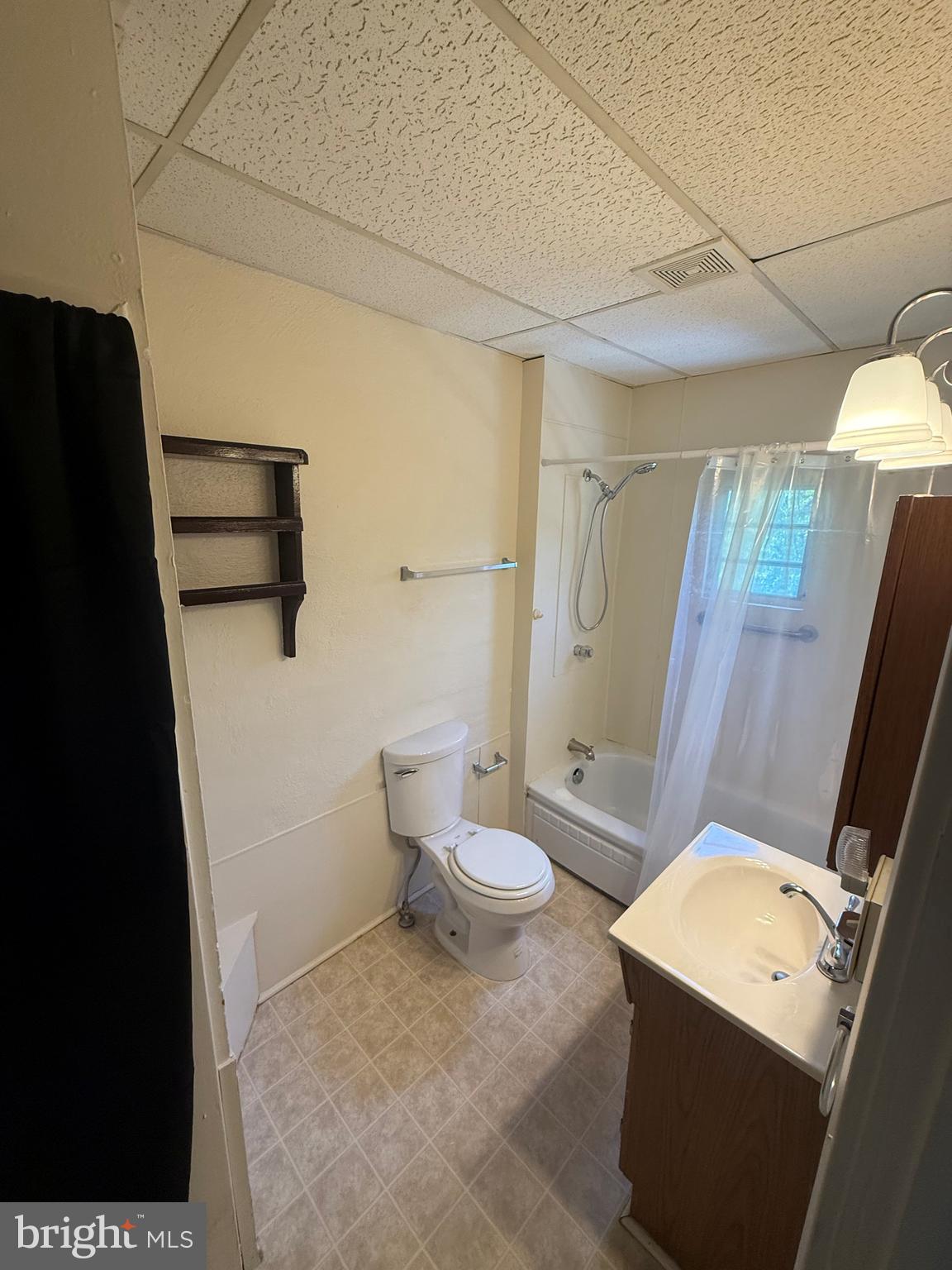 45 Warrenton Road, Unit 6 Fredericksburg, VA 22405 - Photo 4 of 9 a bathroom with a sink toilet and shower