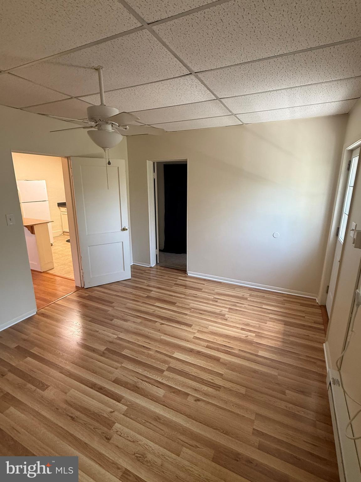 45 Warrenton Road, Unit 6 Fredericksburg, VA 22405 - Photo 5 of 9 wooden floor in an empty room with a window