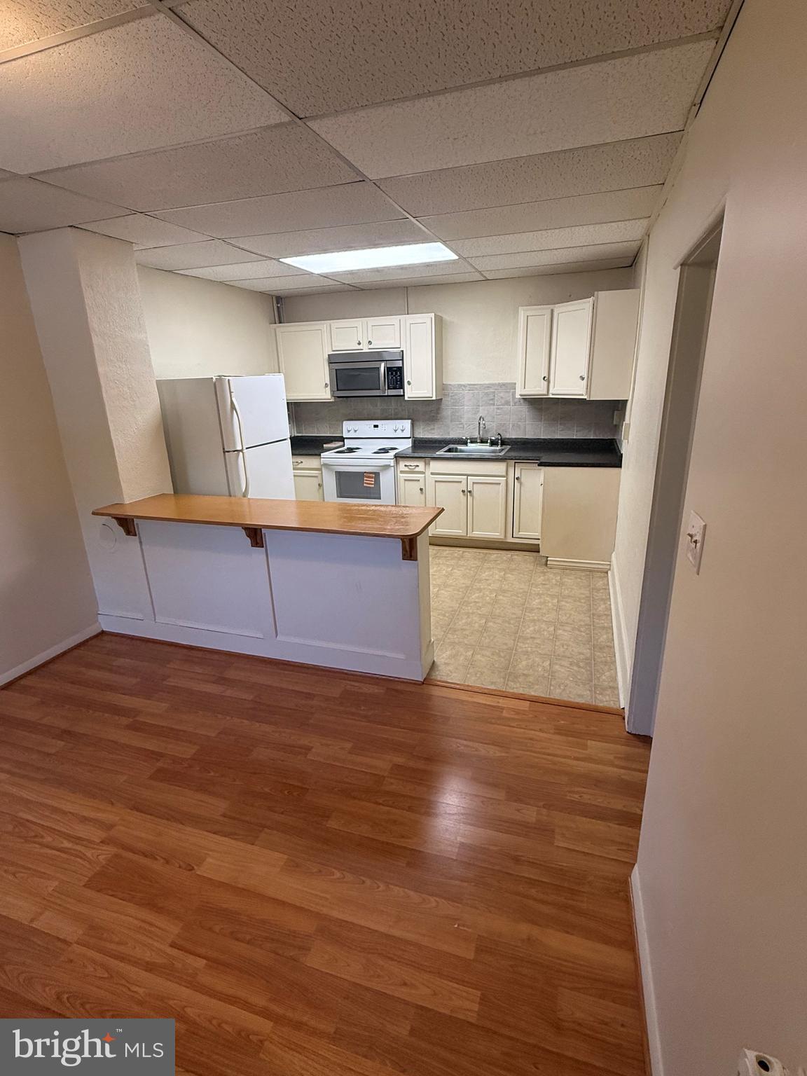 45 Warrenton Road, Unit 6 Fredericksburg, VA 22405 - Photo 8 of 9 a view of kitchen with stainless steel appliances granite countertop a refrigerator and a stove top oven