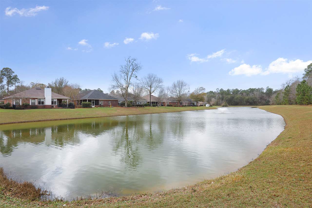149 Mark Twain Loop Foley, AL 36535 - Photo 21 of 23 Community Pond