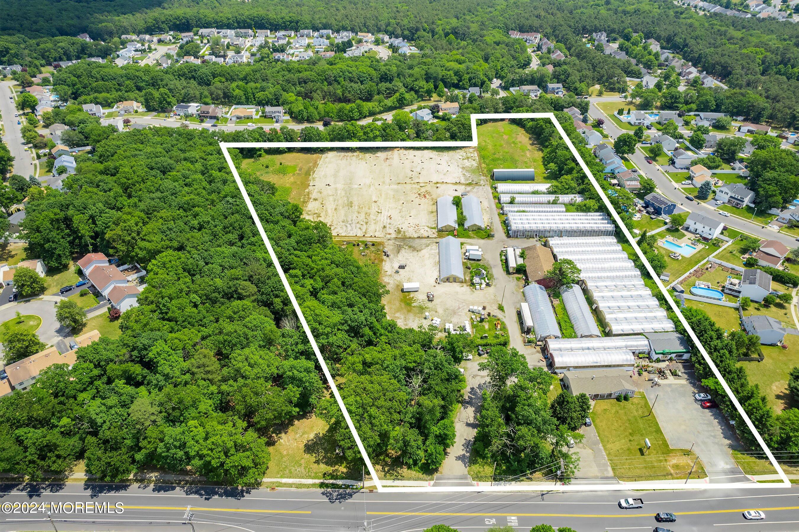 162 Newtons Corner Road Howell, NJ 07731 - Photo 2 of 12 a view of swimming pool with a balcony