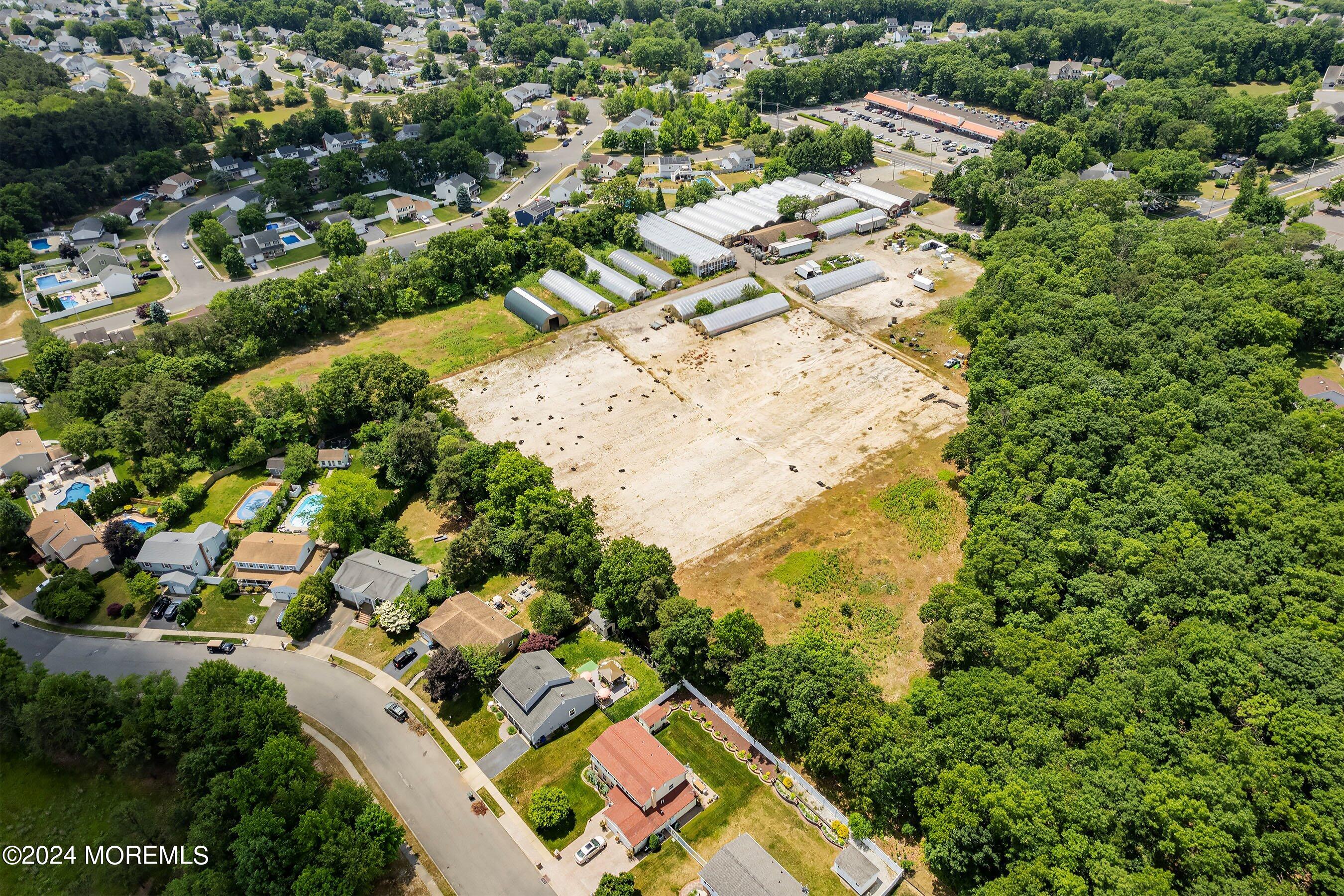 162 Newtons Corner Road Howell, NJ 07731 - Photo 10 of 12 a view of a yard with plants