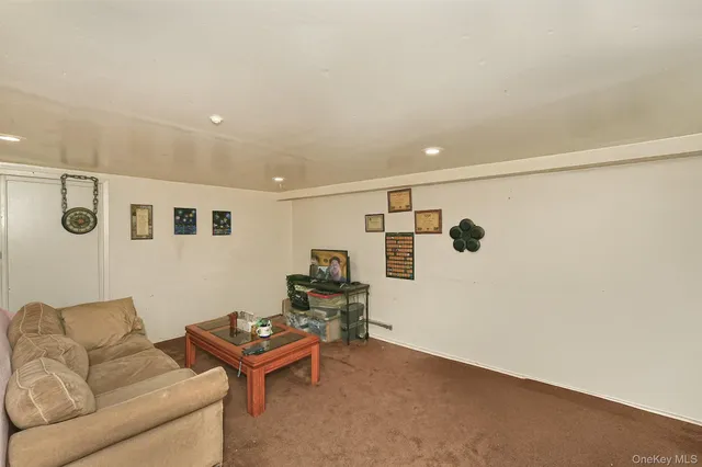 a bathroom with a toilet sink and shower