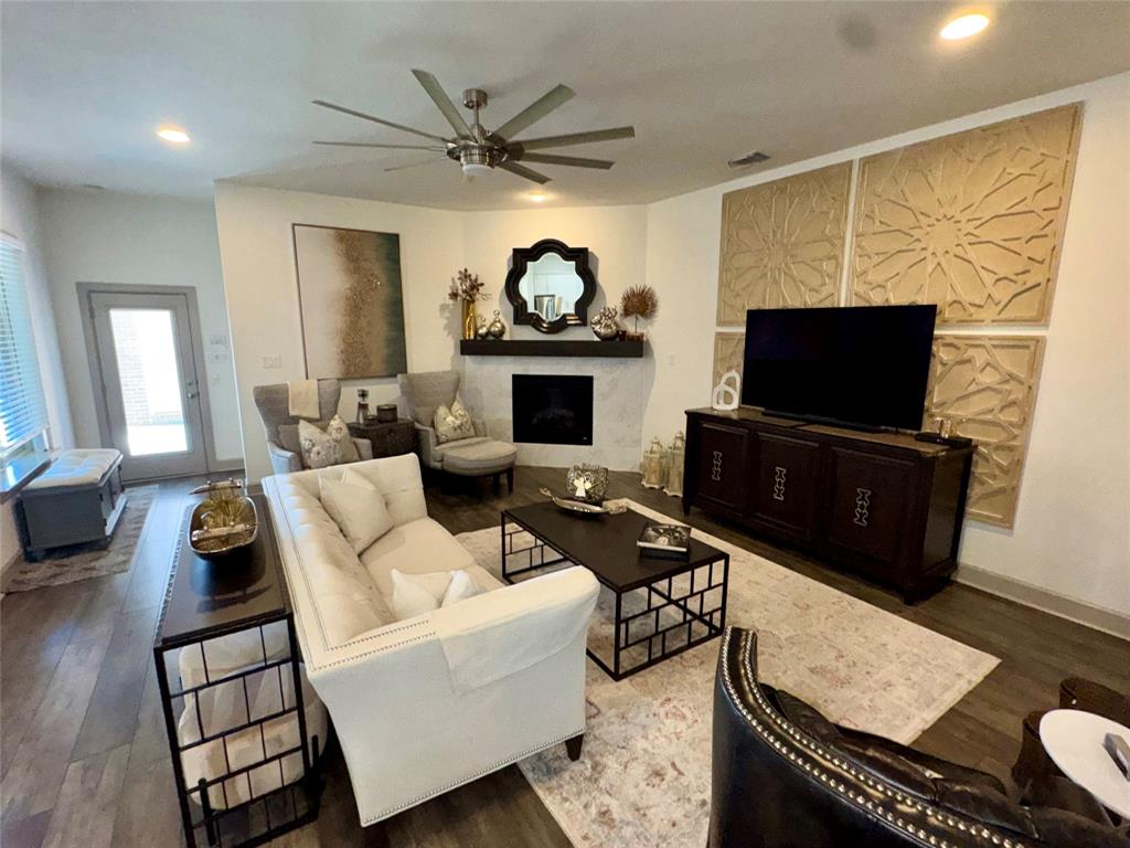 8905 Habersham Drive Rowlett, TX 75089 - Photo 6 of 31 Living room featuring a fireplace, recessed lighting, wood finished floors, and ceiling fan
