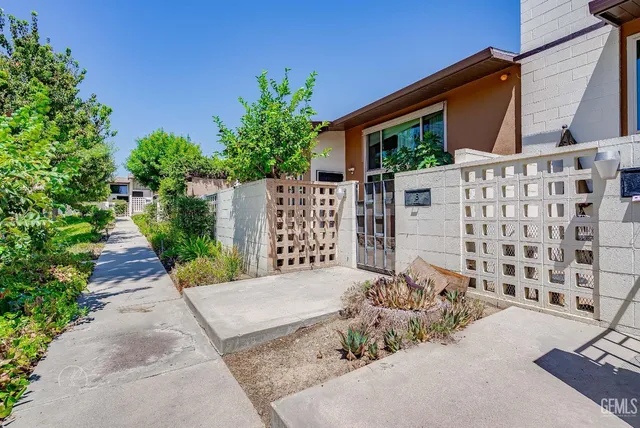 a view of a house with a street