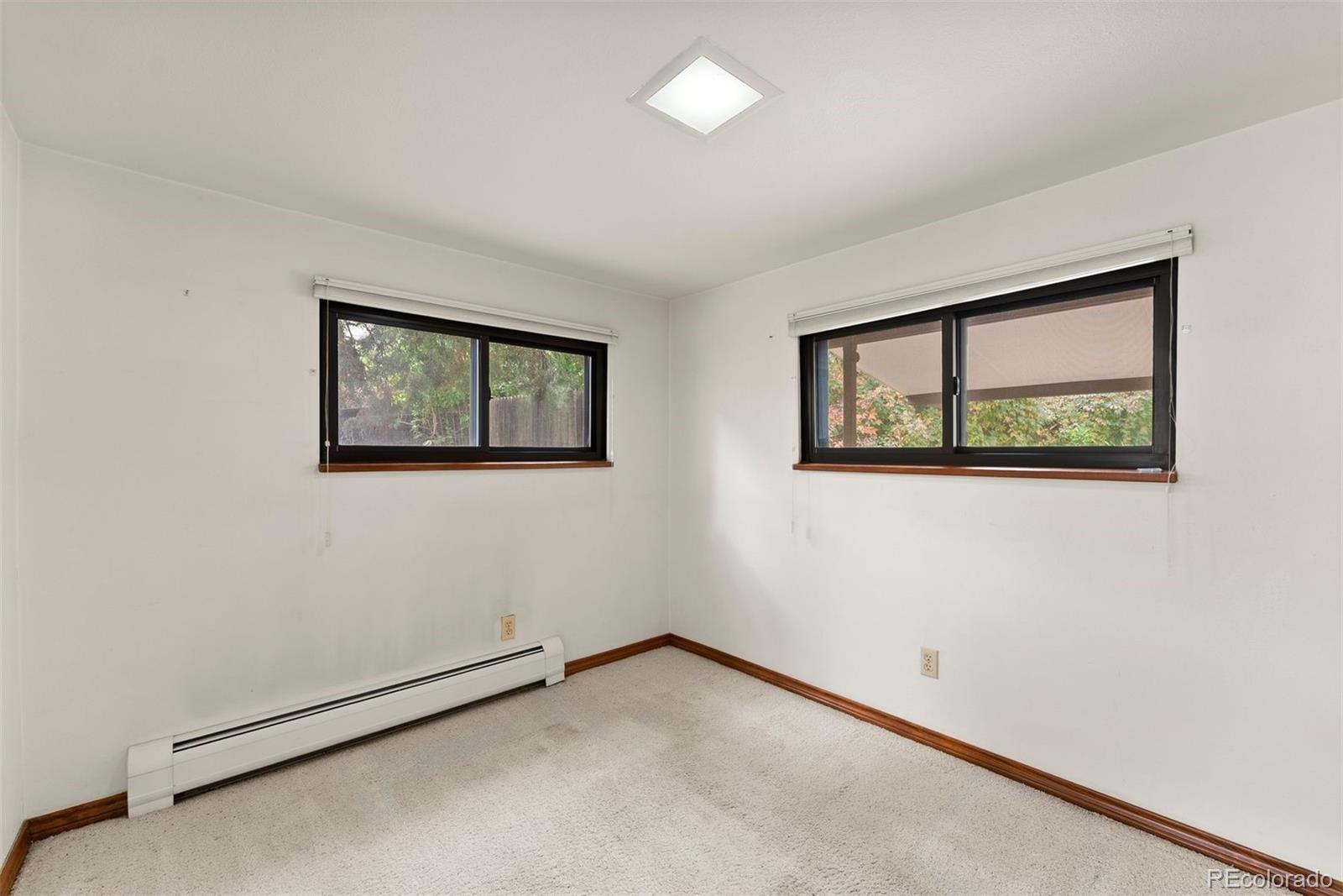 229 Highway 8 Morrison, CO 80465 - Photo 17 of 34 a view of an empty room with a window