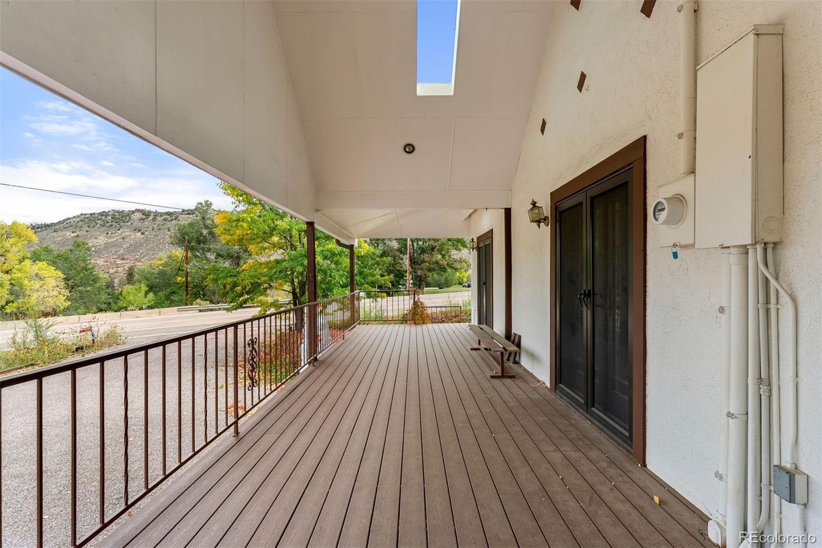 229 Highway 8 Morrison, CO 80465 - Photo 4 of 34 a view of balcony with wooden floor