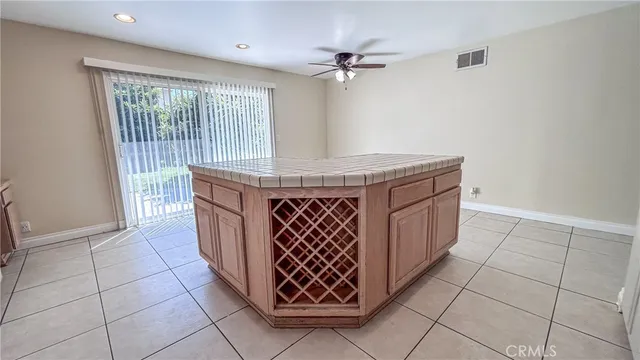 a kitchen with appliances cabinets and a counter top space
