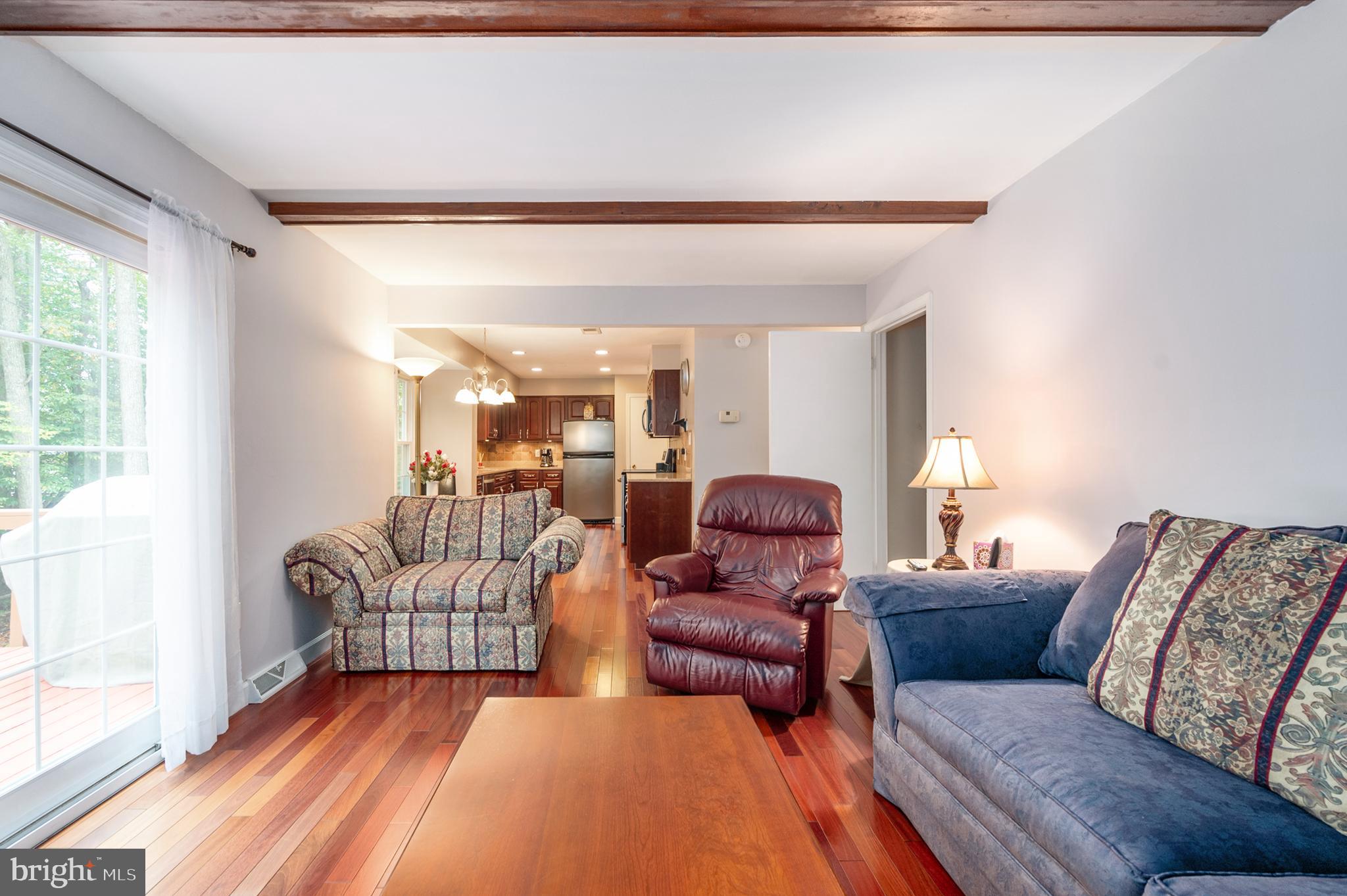 7609 Bertito Lane Springfield, VA 22153 - Photo 24 of 63 Wood beams accent this exceptional family room.