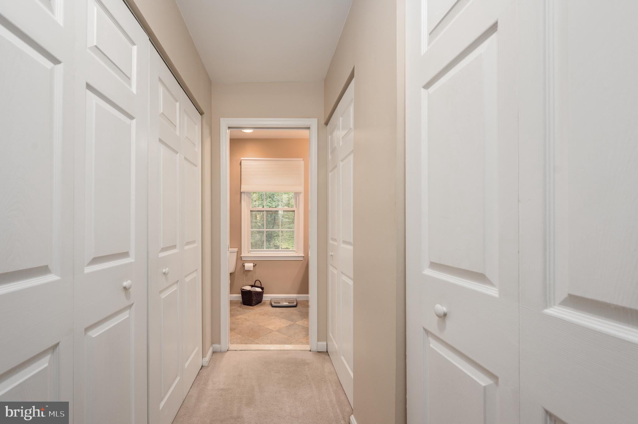 7609 Bertito Lane Springfield, VA 22153 - Photo 31 of 63 Primary bed, ample closet space w/ linen closet.