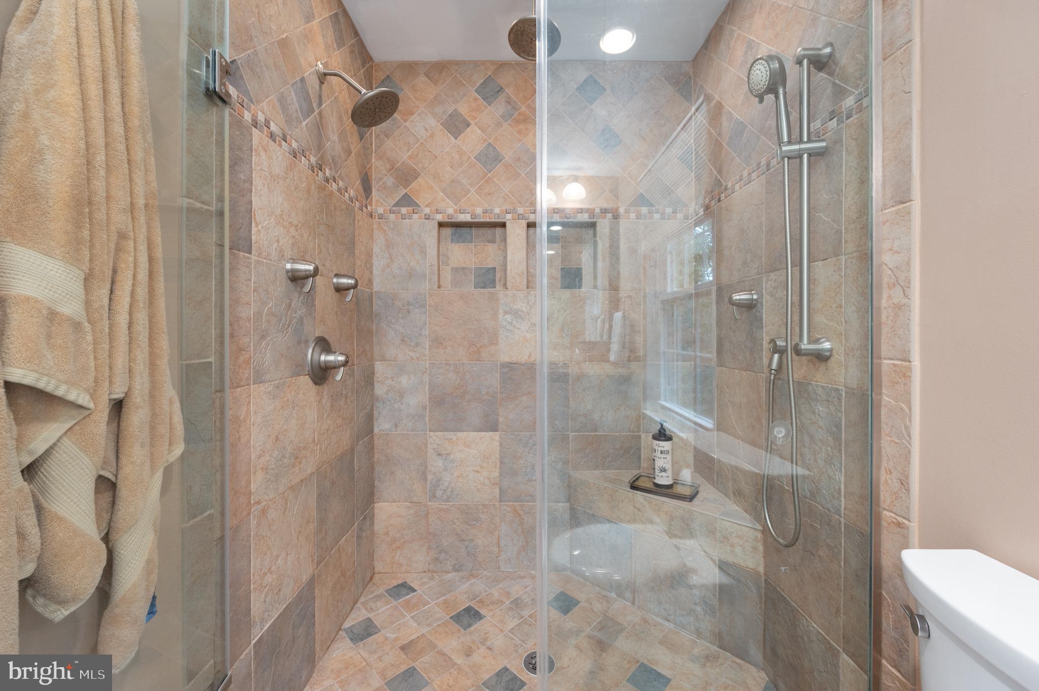 7609 Bertito Lane Springfield, VA 22153 - Photo 35 of 63 Fabulously remodeled primary bath 3 shower heads.