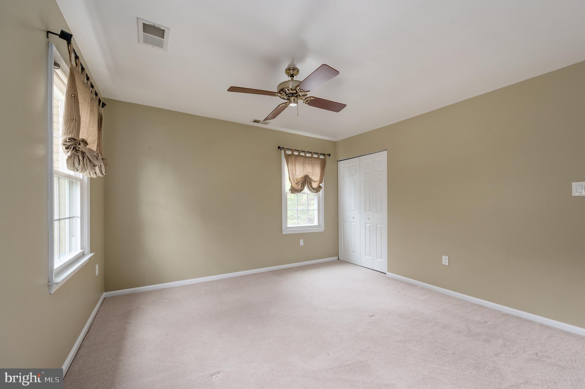 7609 Bertito Lane Springfield, VA 22153 - Photo 38 of 63 Bedroom 2 ceiling fan & large closet.