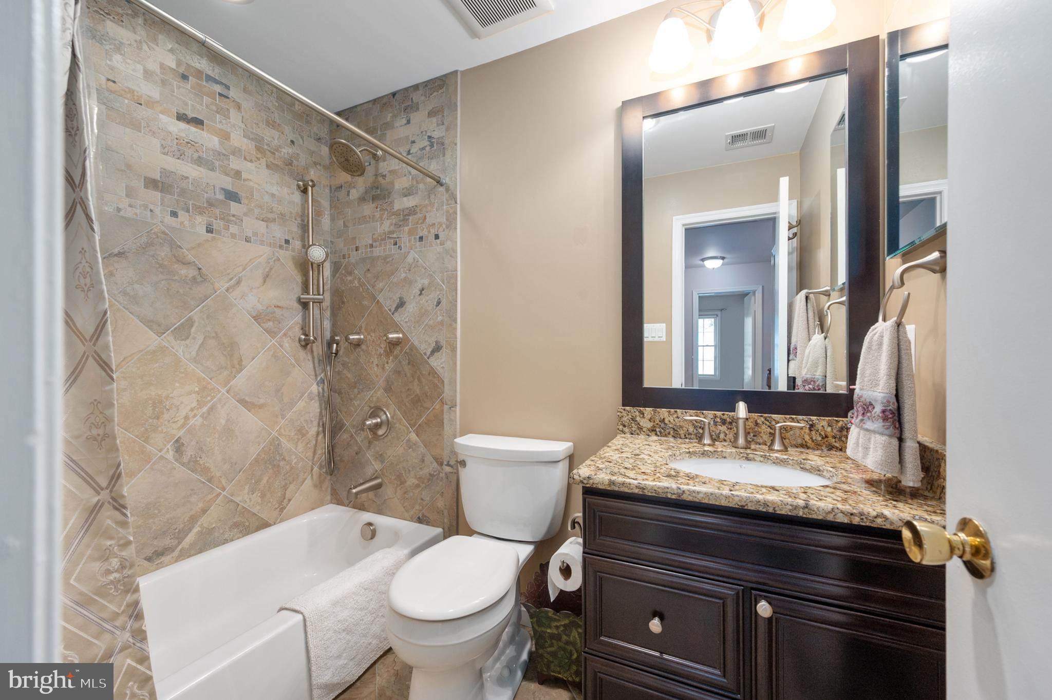 7609 Bertito Lane Springfield, VA 22153 - Photo 44 of 63 Exquisite tile surround in tub/shower.