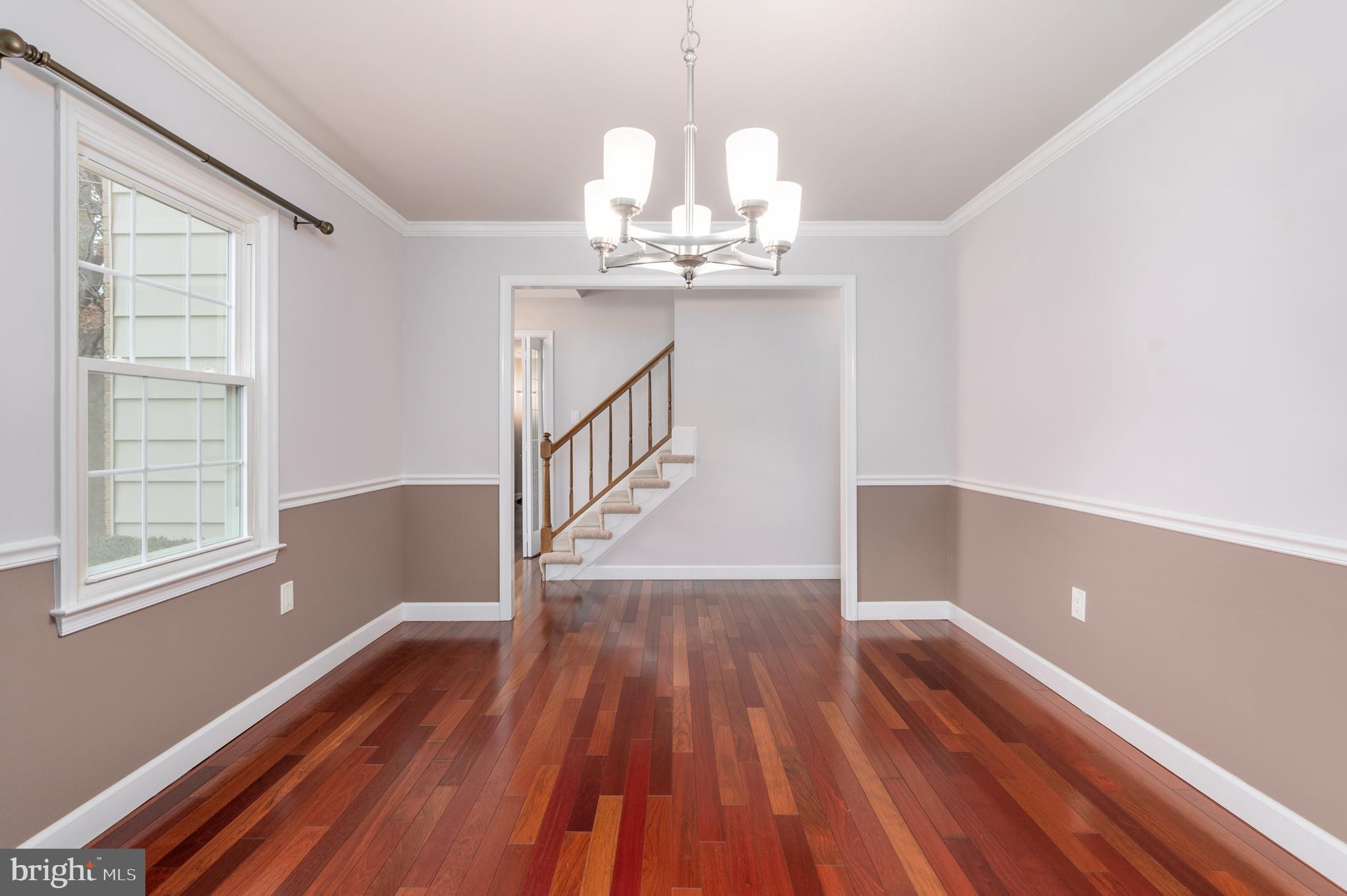 7609 Bertito Lane Springfield, VA 22153 - Photo 8 of 63 Formal dining room with crown and chair molding