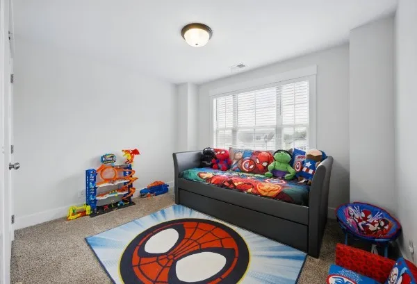 a living room with baby toys