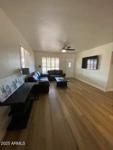a living room with furniture and a couch