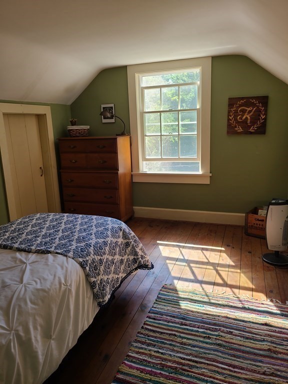 199 New Bedford Road Rochester, MA 02770 - Photo 11 of 20 a bedroom with a bed and a dresser