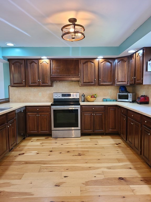 199 New Bedford Road Rochester, MA 02770 - Photo 3 of 20 a kitchen with a sink cabinets and window