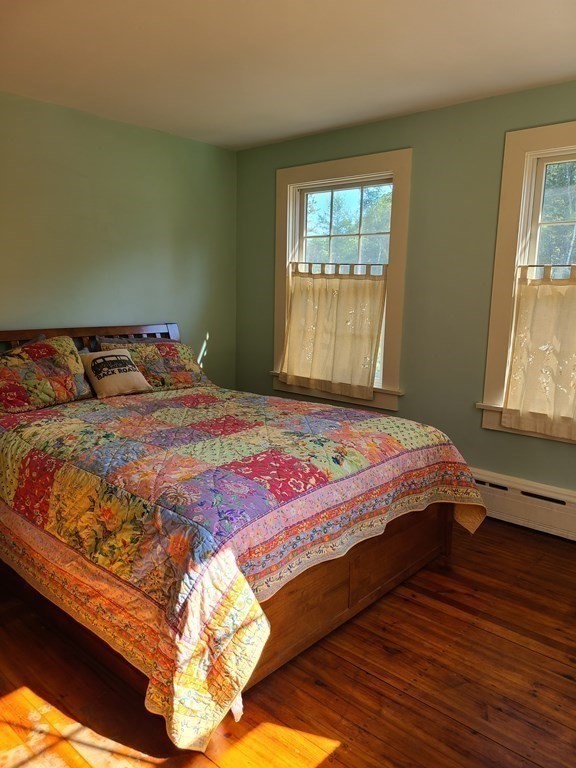 199 New Bedford Road Rochester, MA 02770 - Photo 7 of 20 a bedroom with a bed and a window