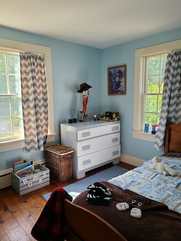 199 New Bedford Road Rochester, MA 02770 - Photo 9 of 20 a bedroom with a bed and a window
