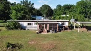 a view of backyard with green space