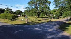 9830 Esthlyn Street Keithville, LA 71047 - Photo 6 of 16 a view of backyard with green space